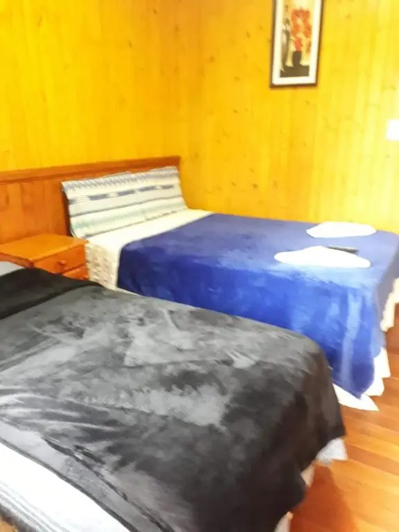 Petit Hotel Caraguata - Chambres