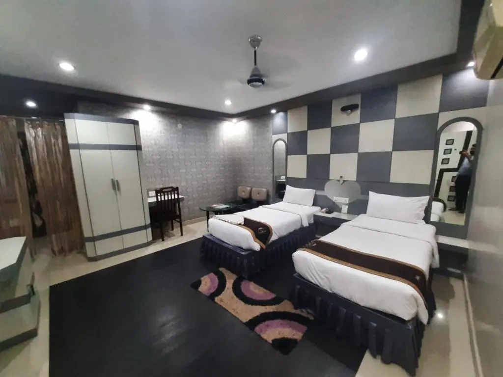 Hotel Corporate Inn - Chambres