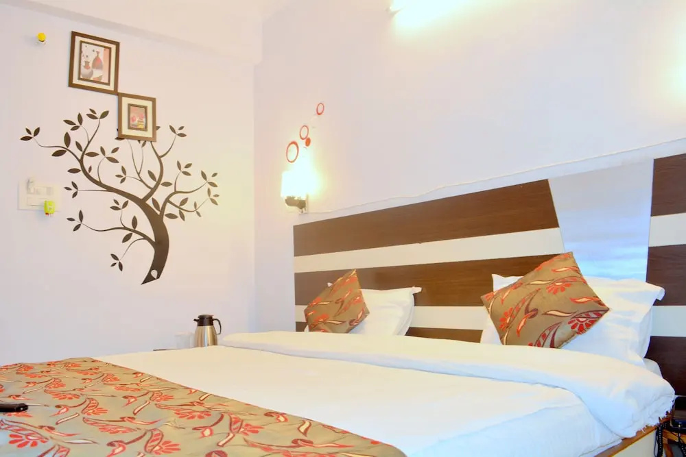 Hotel Mani International - Chambres