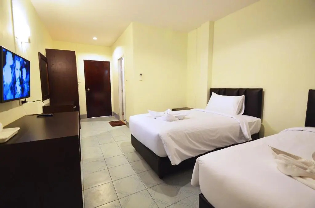 Paripas Express Hotel Patong - Chambres