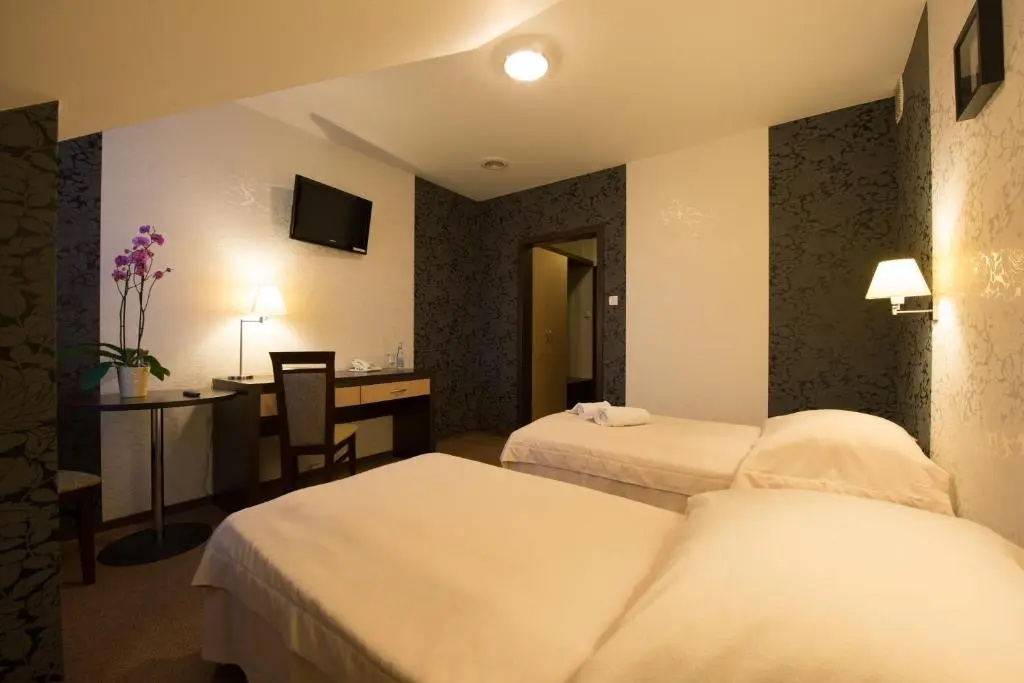Hotel Cztery Pory Roku - Chambres