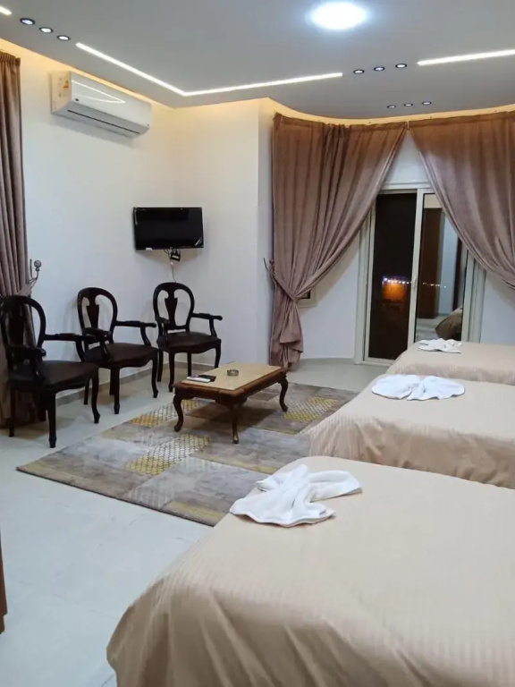 Deluxe Quadruple room with balcony