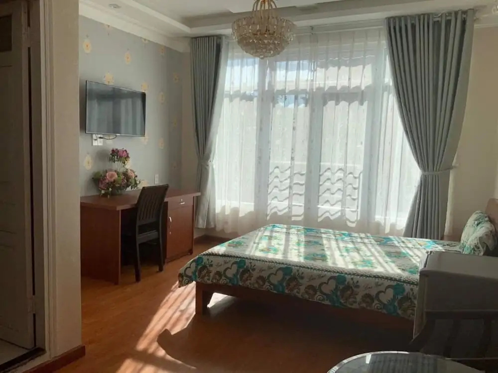 Dang Uyen Hotel - Chambres