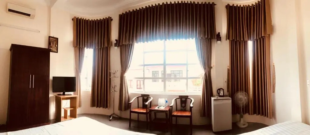 Nam Long Hotel - Chambres