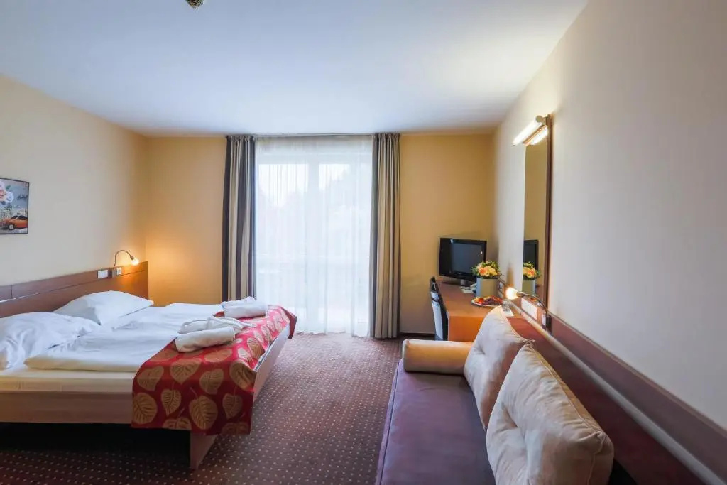 CE Plaza Hotel - Chambres