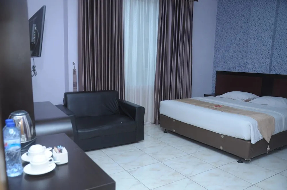 Griya Hotel - Chambres