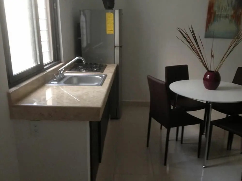 Ca' del Sol Condo Hotel - Chambres