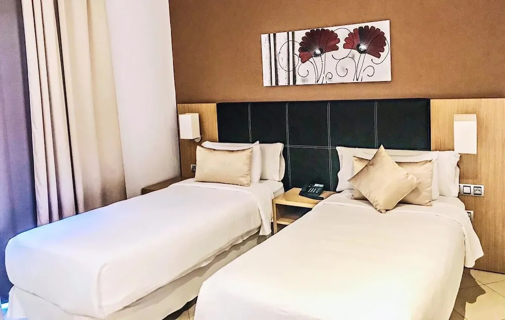 Prestige Hotel - Chambres