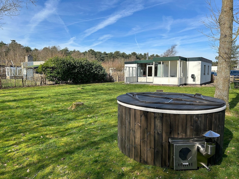 Cozy Holiday Home in Den Burg With hot tub