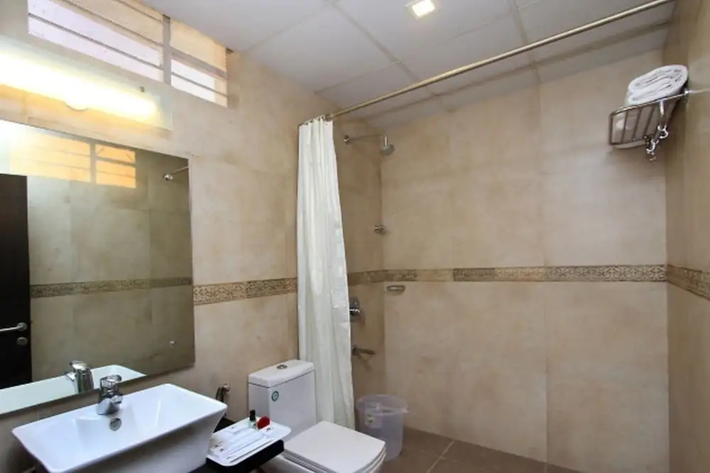 Ni Ambaari Suites - Chambres