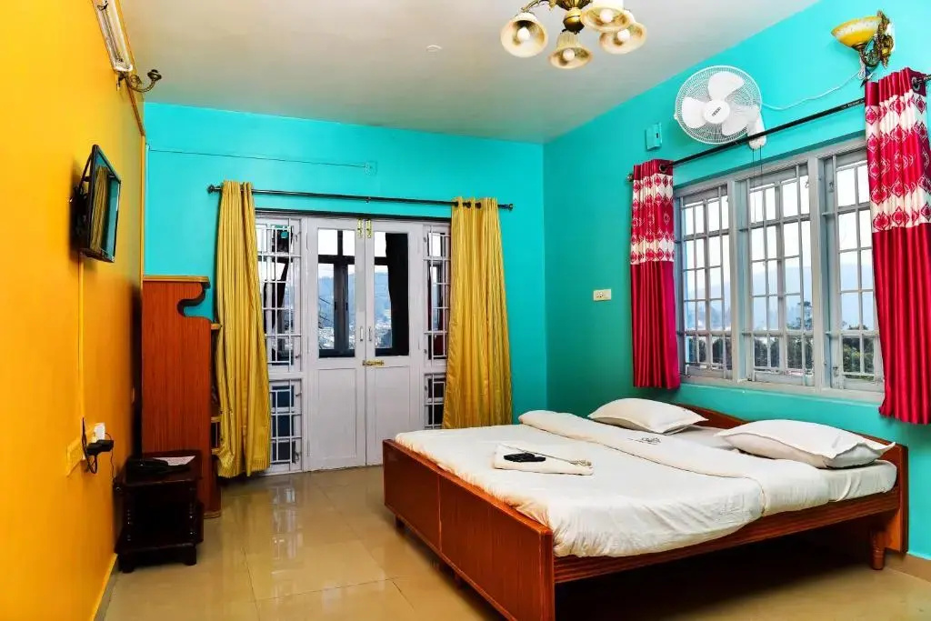 RK Holiday Home - Chambres