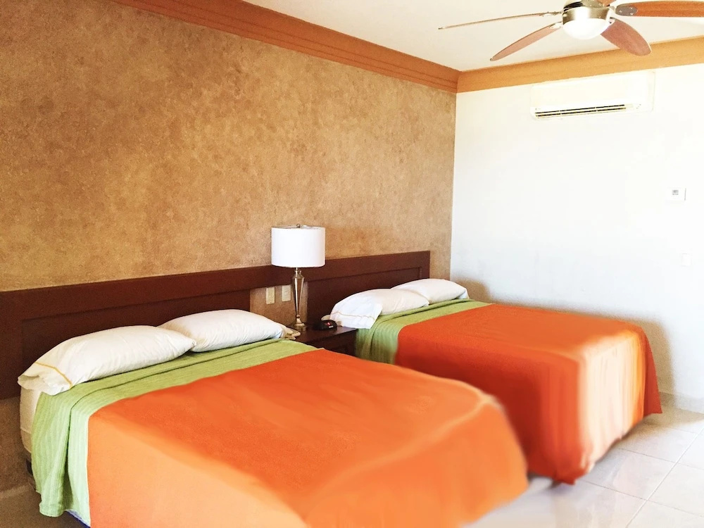 Hotel Palmas De Cortez - Chambres
