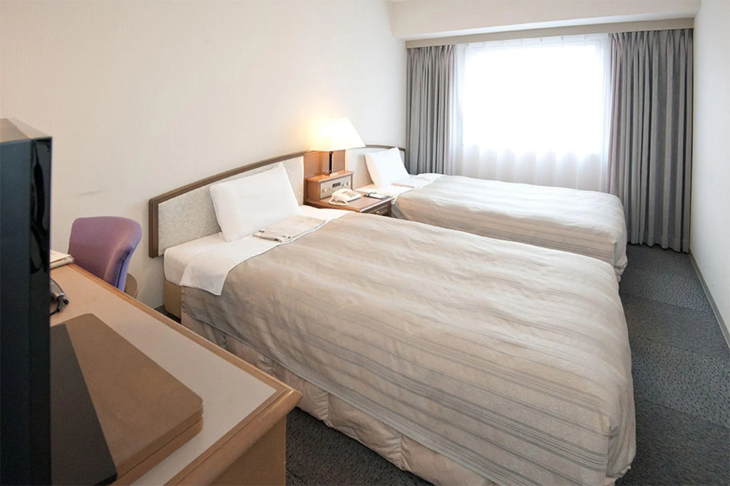 Hotel Sunroute Niigata - Chambres