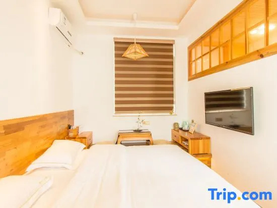 Jue Se Garden Theme Inn - Chambres