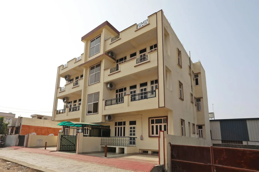 Urvi Apartments by OYO Rooms