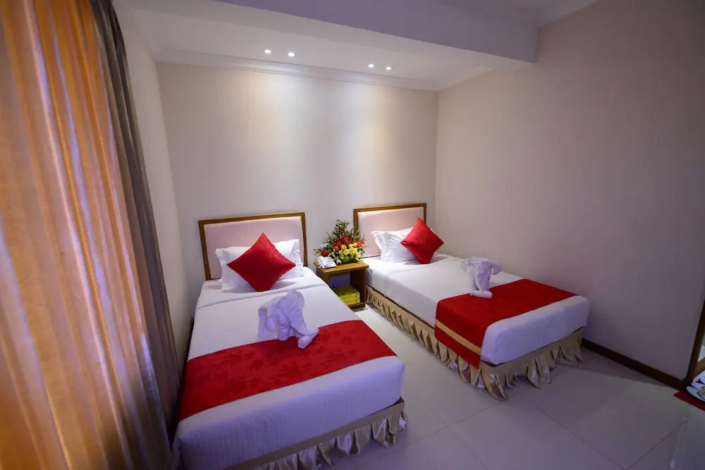 Yadanar Theingi Hotel - Chambres