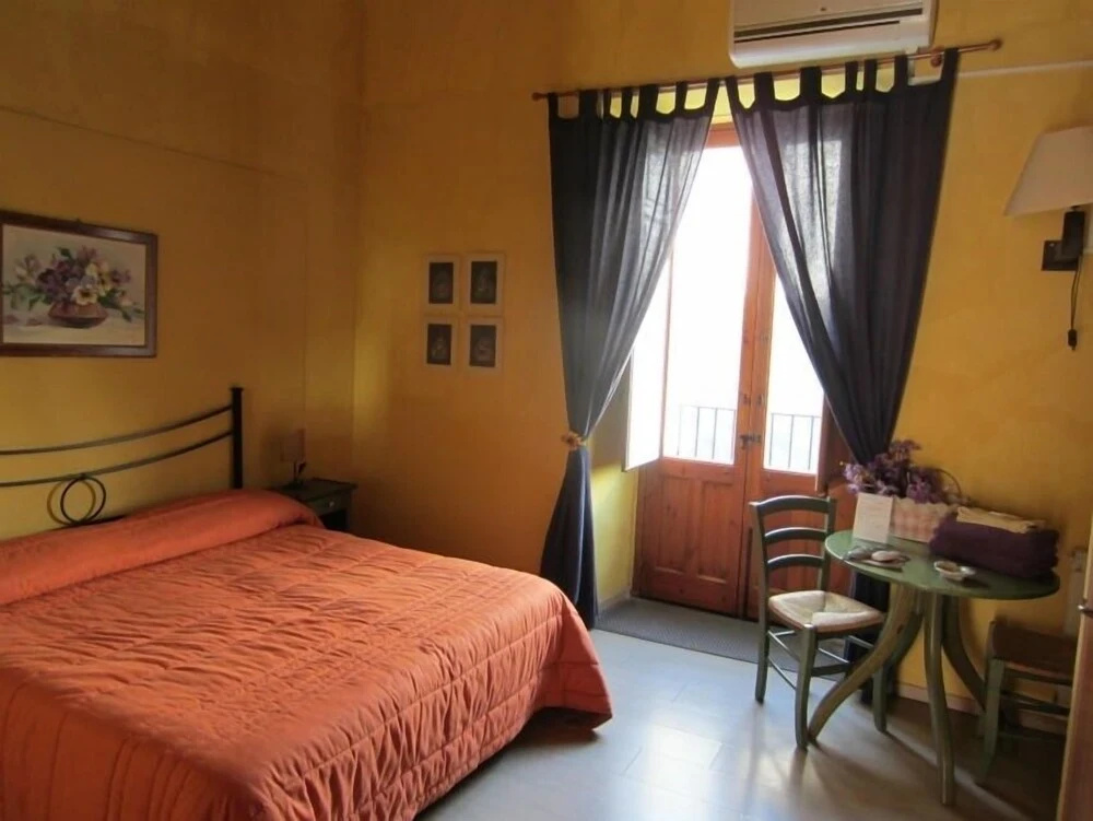 Standard Triple room with balcony