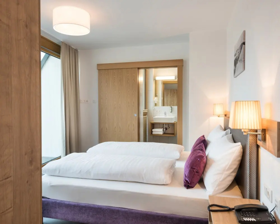 AlpenParks Hotel & Apartment Central - Chambres