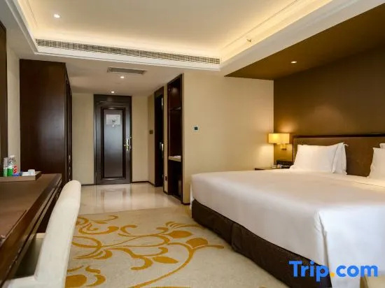Sky World Hotel Qingdao - Chambres