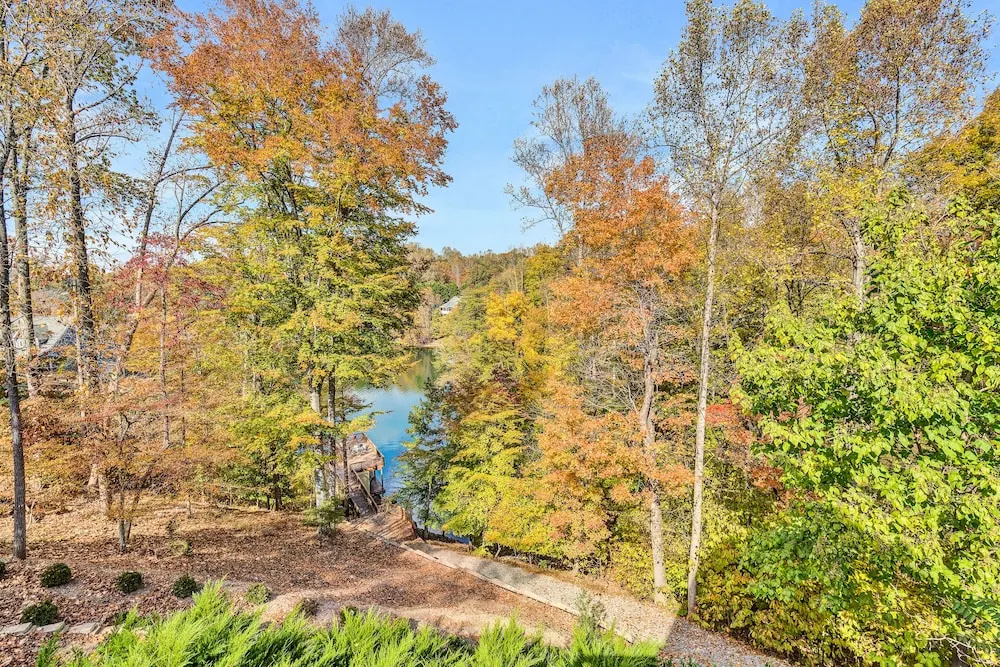 Osprey Cove - Custom Lakefront Home With 2-story Dock, Wifi, Game Room and Fireplace