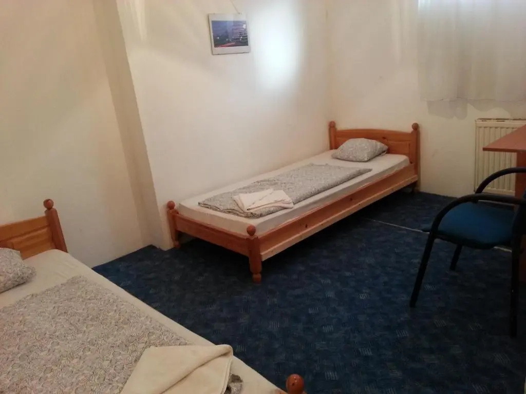 Carmen Pension - Chambres
