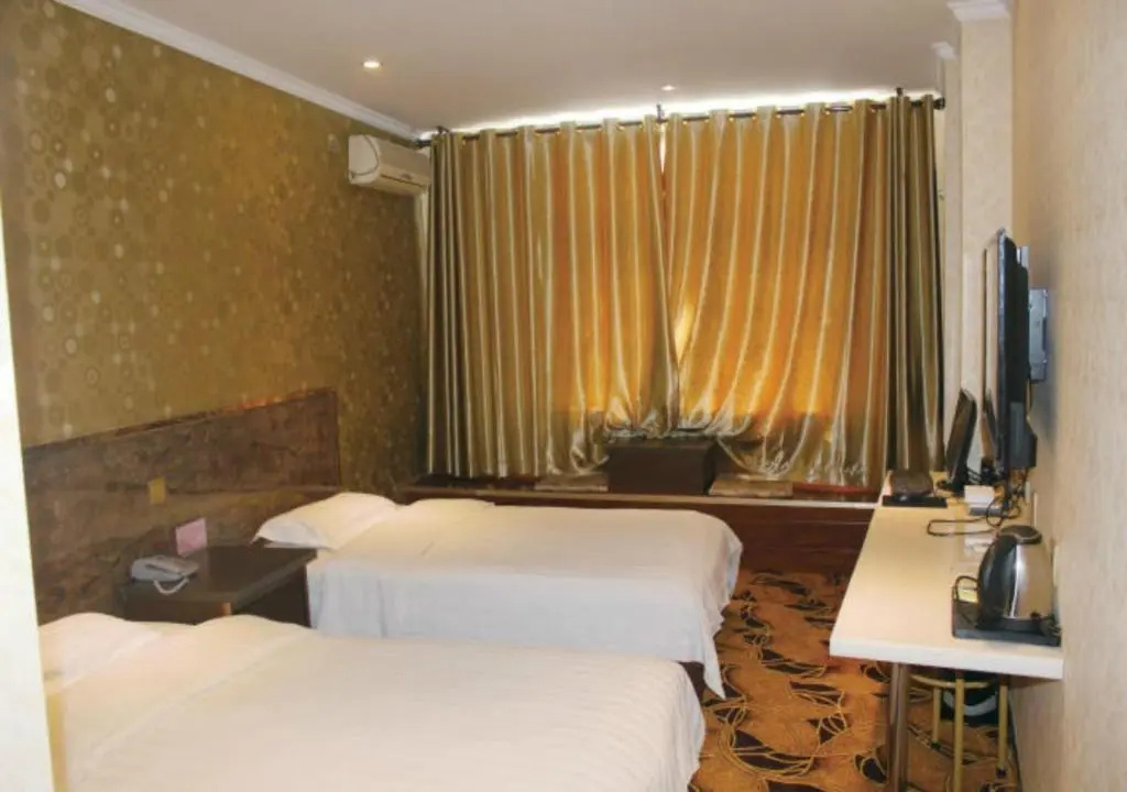 Zhangye Liangmao Hotel - Chambres