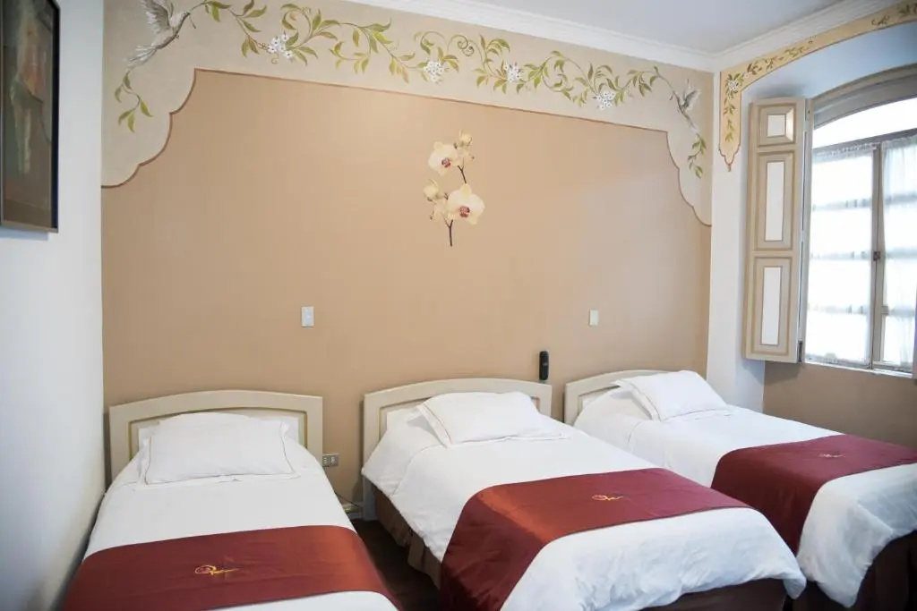 Hostal La Orqudea - Chambres