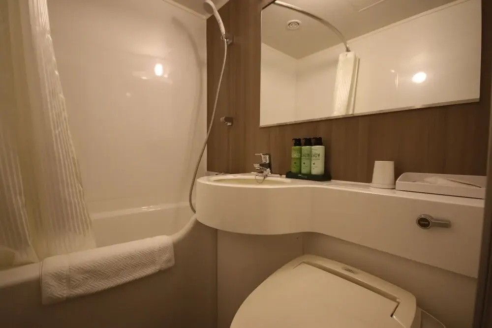 Kita Hotel - Chambres