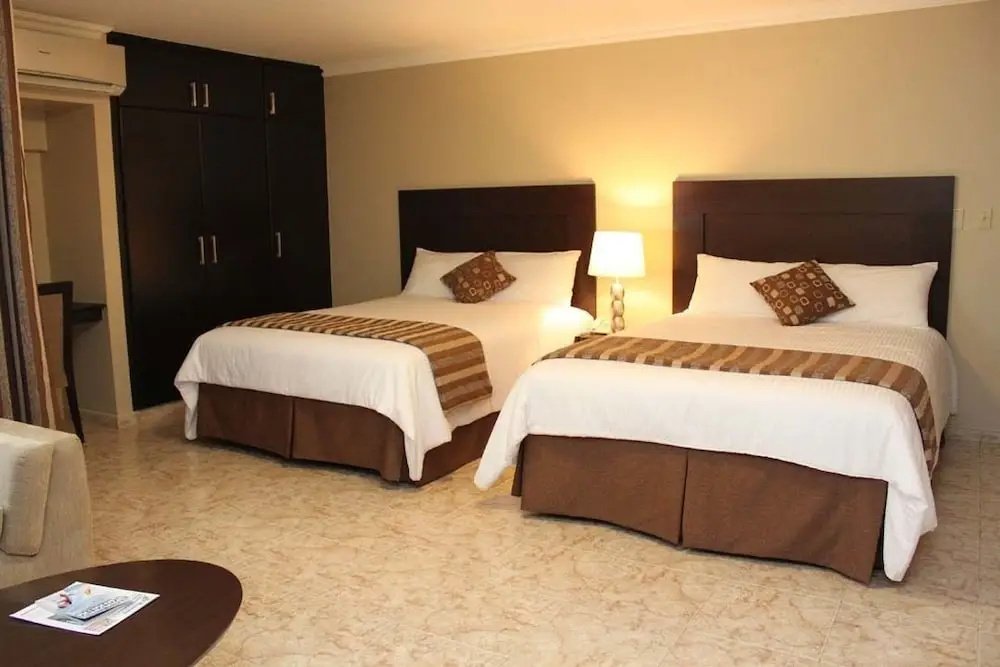 Aparthotel Sevilla Suites - Chambres