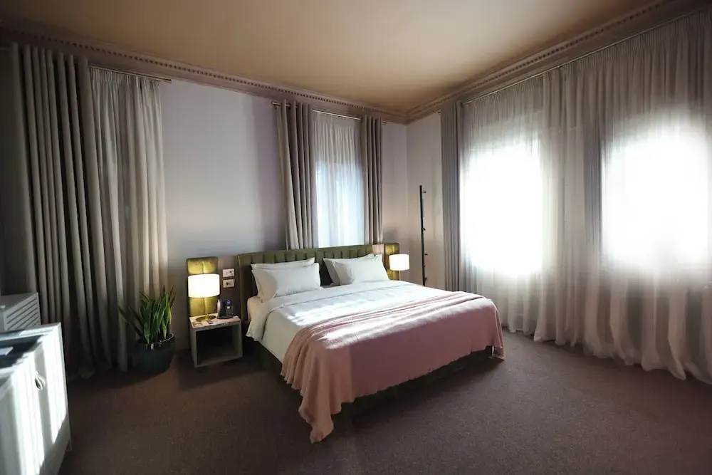 Superior Double room with balcony and with garden view (full double bed)