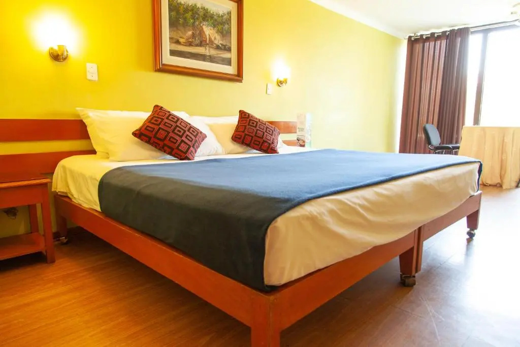 Hotel Holiday Suites - Chambres