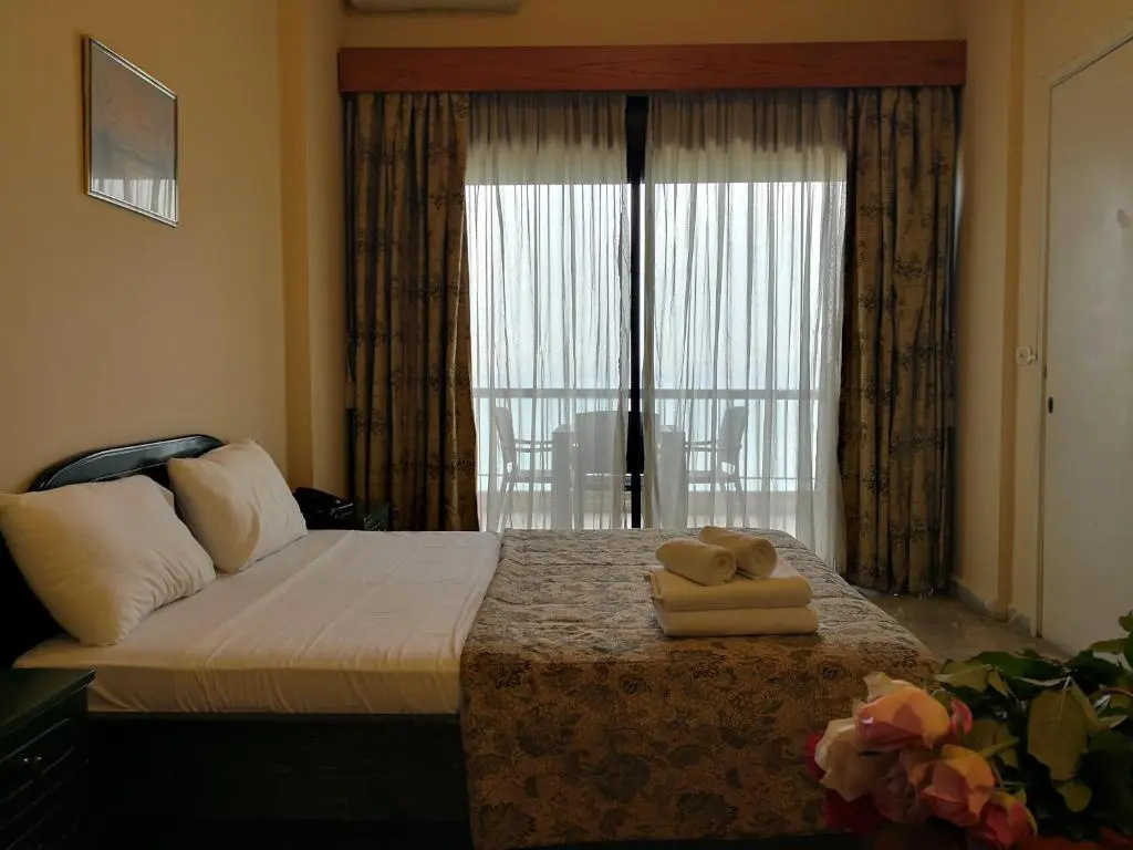 Holiday Suites Hotel And Beach - Chambres
