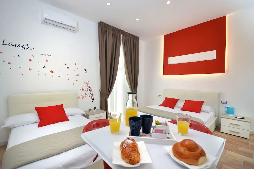 Luxury Quadruple room with balcony and with city view