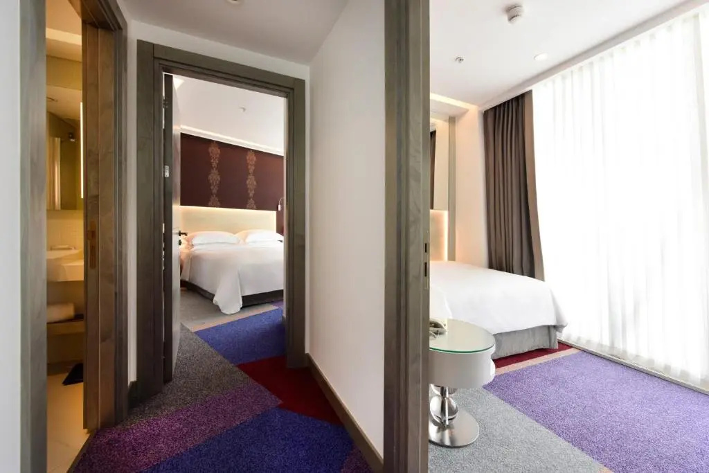 Burgu Arjaan by Rotana Hotel - Chambres