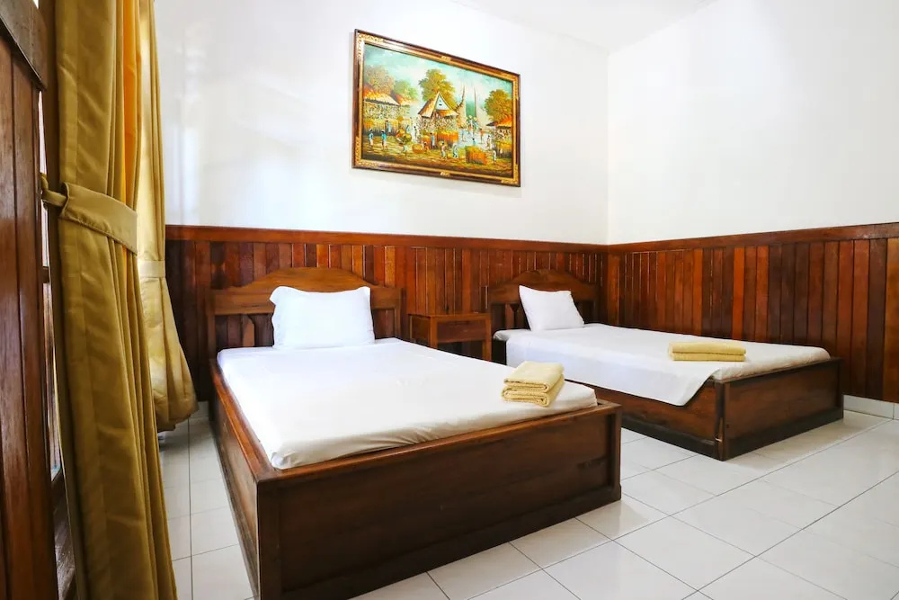 Puri Nusa Beach Hotel - Chambres