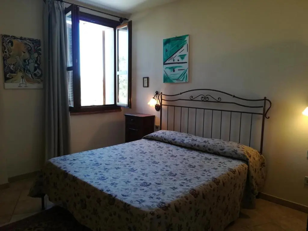 Standard Triple room with garden view