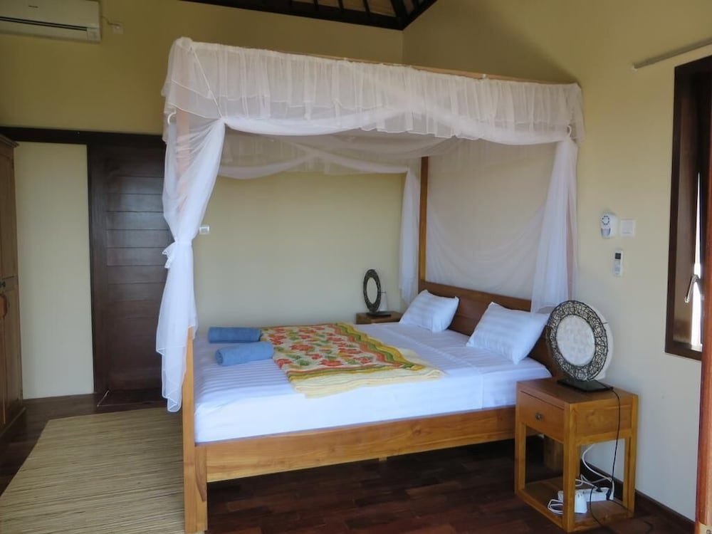 Отель Jukung Dive Resort Bali в Пурвакерти