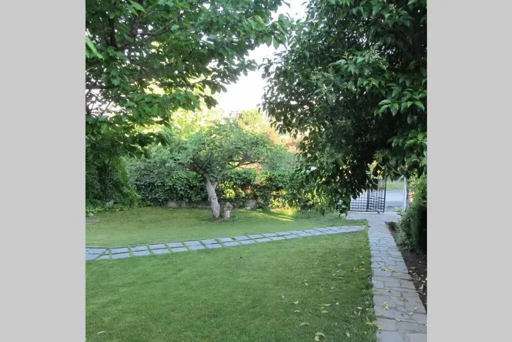 Traditional Apartment part of a Detached Villa on a luxurious Hill of Thessaloniki PANORAMA with a private garden with trees ,also available for Family and other gatherings and Kid's parties - under 13 , for less than 20 people alltogether