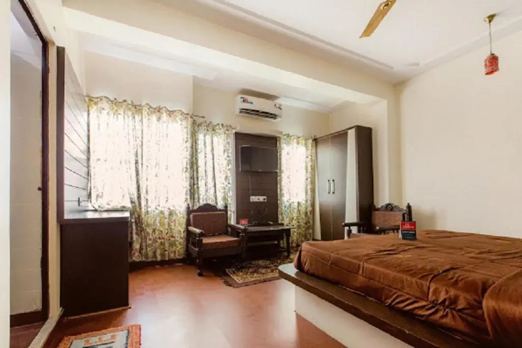 Hotel Holiday Home - Chambres