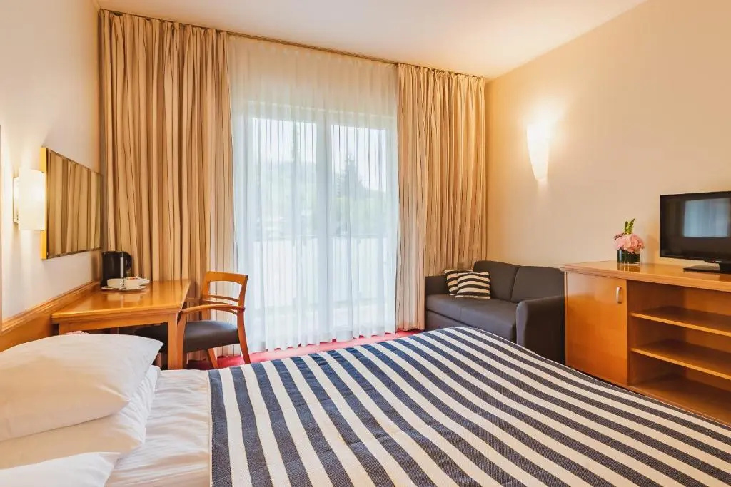 Ramada Hotel & Suites by Wyndham Kranjska Gora - Chambres