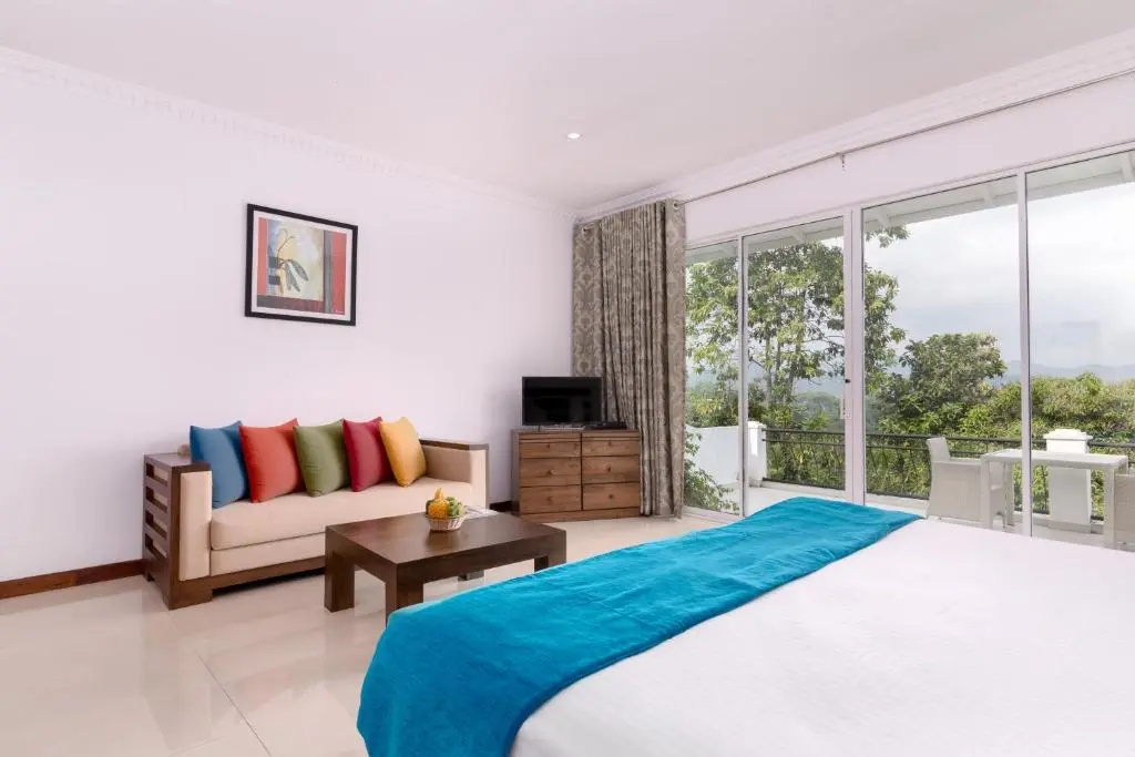 Standard Triple room with garden view