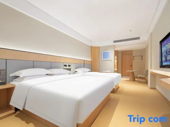 Qingxin Hotel - Chambres