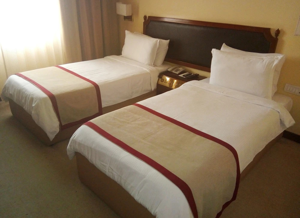 Dynasty Hotel - Chambres