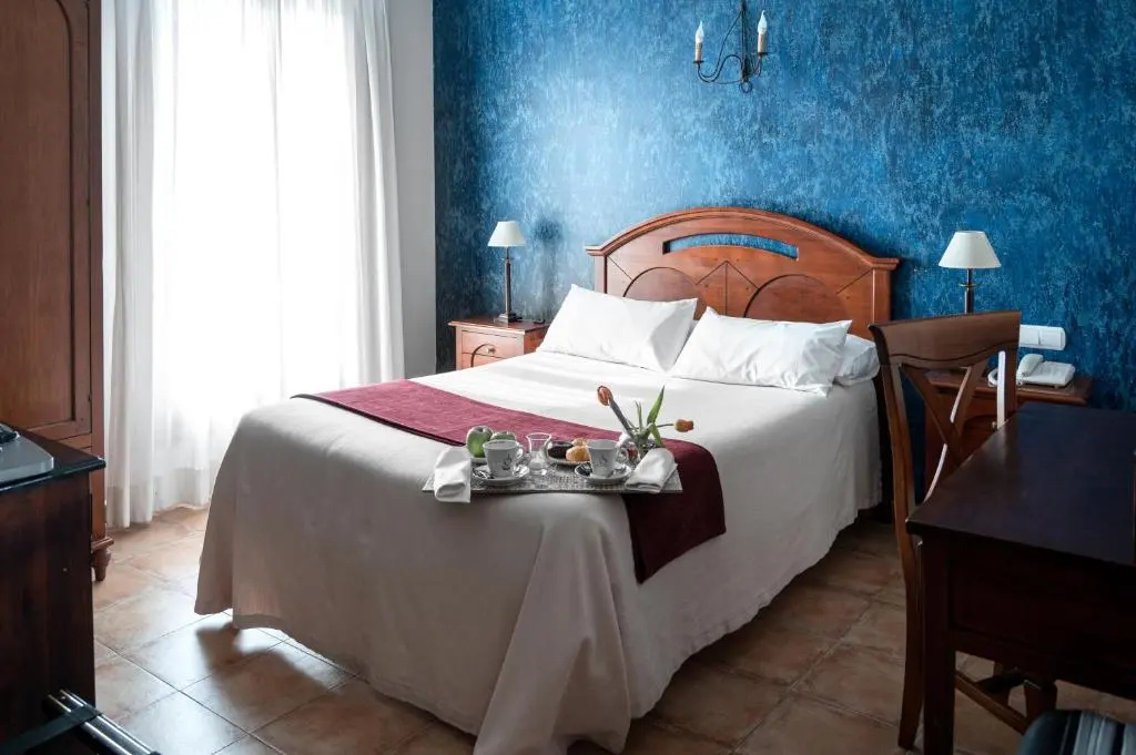 Hotel El Jardín de la Abadía - Chambres