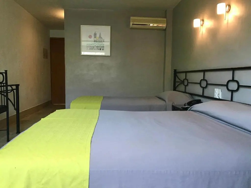 Hotel Arboledas Expo - Chambres