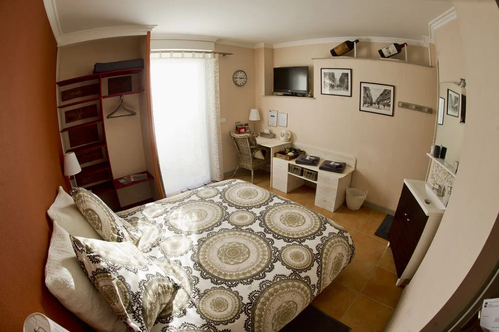Voir la photo 3 — La maison cachée