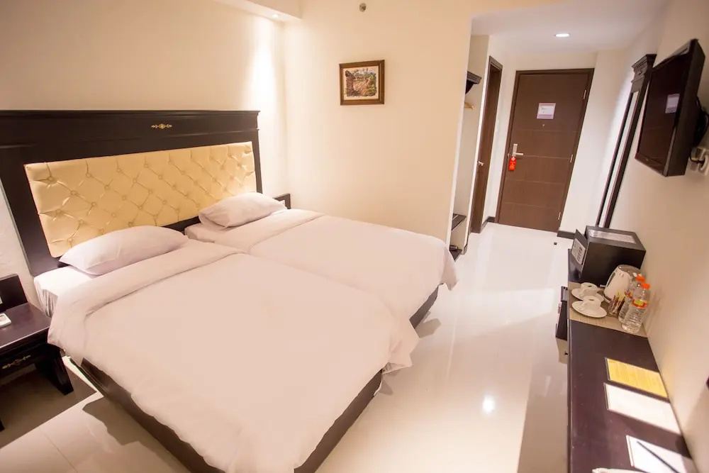 Same Hotel Malang - Chambres