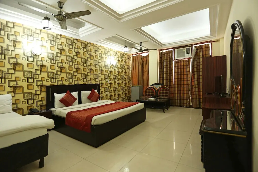 OYO 7844 Hotel Welcome Plaza - Chambres