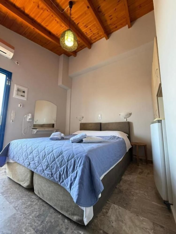 Standard Quadruple room with balcony and with garden view