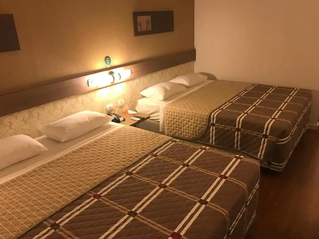 Hotel 10 Palmas - Chambres